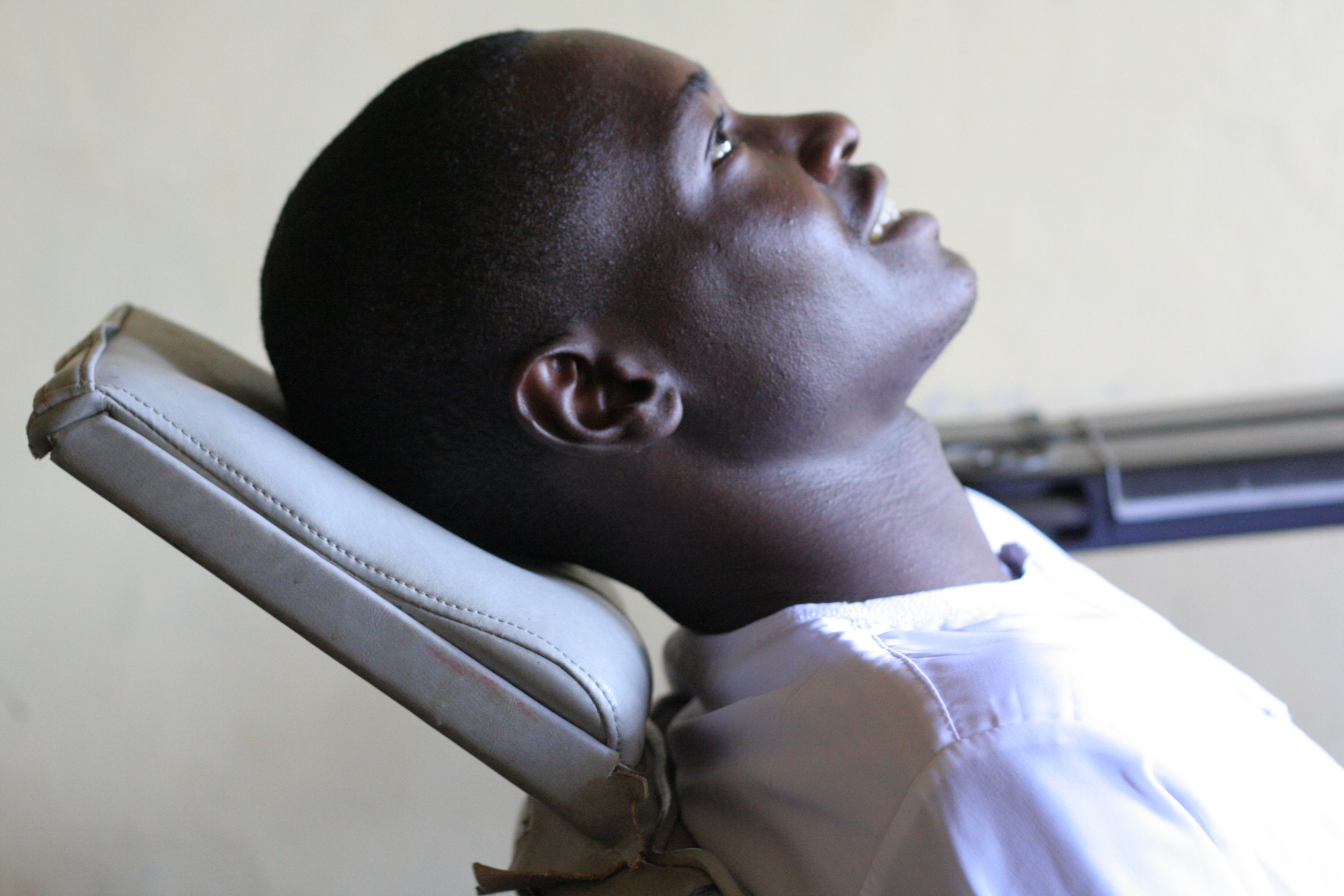 Profile of man sitting in dentist chair