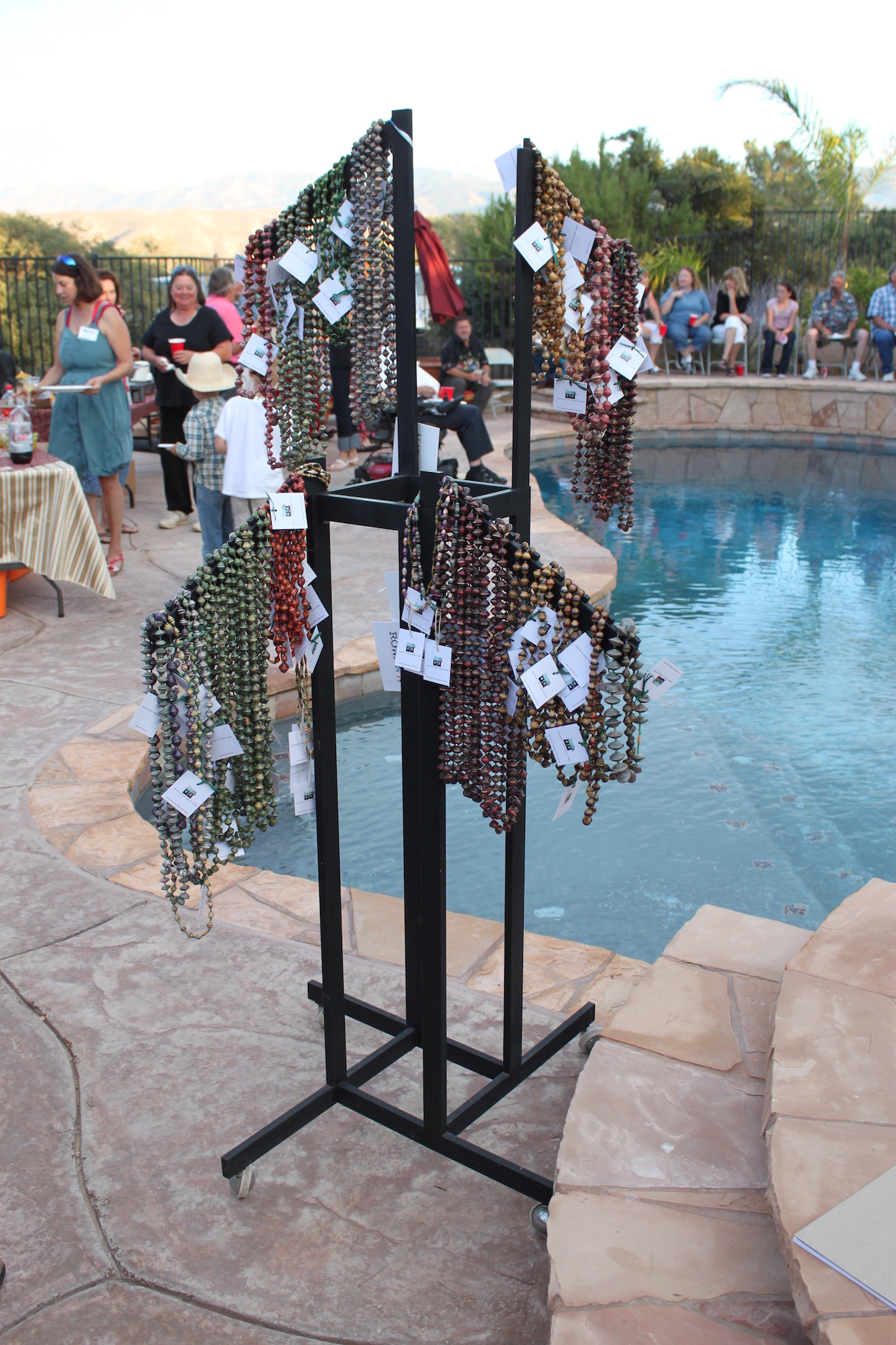 A stand with hanging beaded necklaces