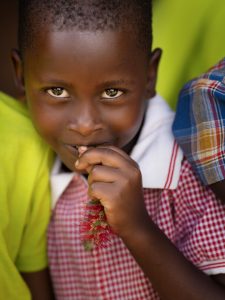 A little girl smiling in Uganda